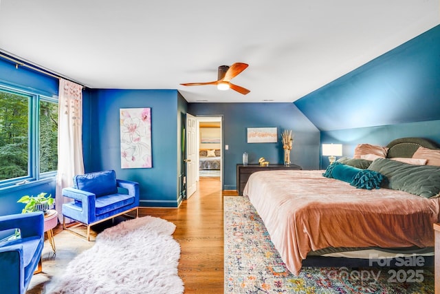 3920 Tilley Morris Rd, Matthews, NC 28105 - bedroom with wood finished floors, ceiling fan, and lofted ceiling