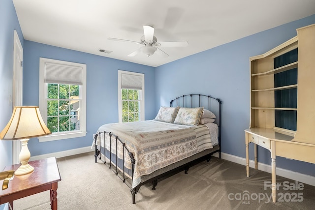 6123 Abergele Ln, Matthews, NC 28104 - carpeted bedroom featuring baseboards and a ceiling fan