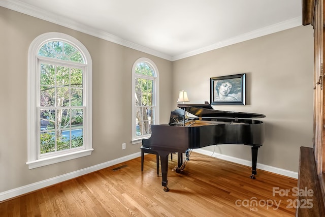 6123 Abergele Ln, Matthews, NC 28104 - sitting room featuring wood finished floors and ornamental molding