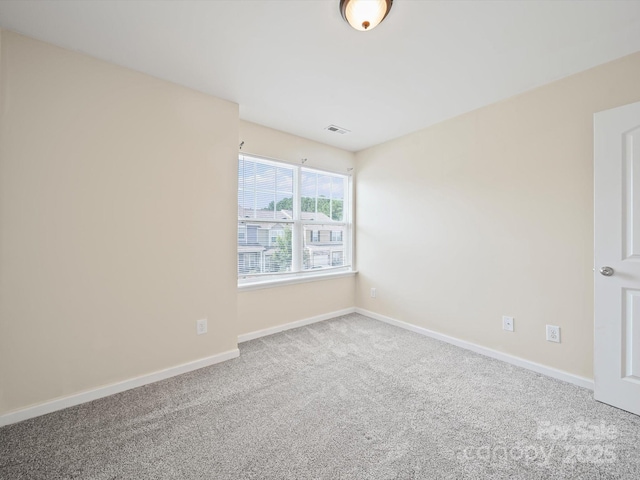 15239 Wrights Crossing Dr, Charlotte, NC 28278 - carpeted spare room featuring baseboards