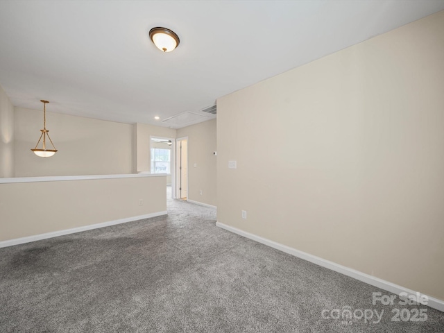 15239 Wrights Crossing Dr, Charlotte, NC 28278 - carpeted spare room with baseboards and attic access