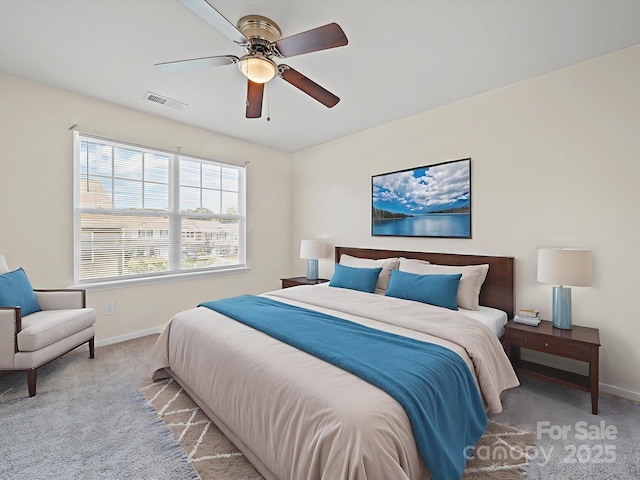 15239 Wrights Crossing Dr, Charlotte, NC 28278 - carpeted bedroom featuring baseboards and a ceiling fan