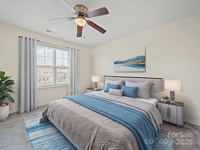 15239 Wrights Crossing Dr, Charlotte, NC 28278 - carpeted bedroom featuring baseboards and a ceiling fan