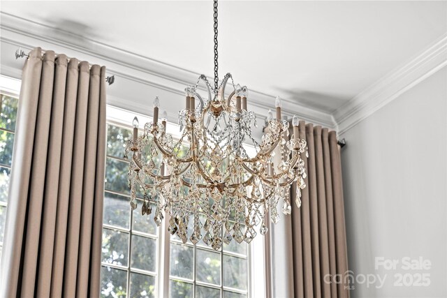 12336 Tantallon Ct, Pineville, NC 28134 - detailed view of a chandelier and crown molding