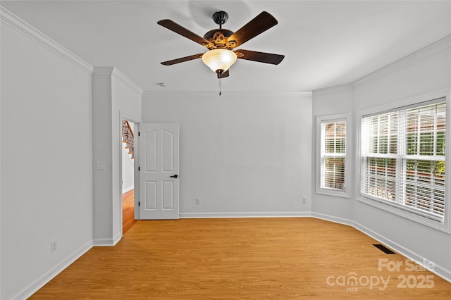 12336 Tantallon Ct, Pineville, NC 28134 - spare room featuring crown molding, light wood finished floors, and a ceiling fan