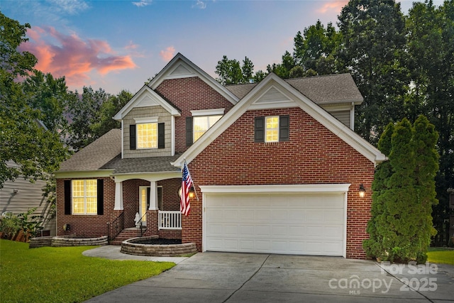 12336 Tantallon Ct, Pineville, NC 28134 - view of front of house featuring driveway, brick siding, a lawn, a shingled roof, and a garage