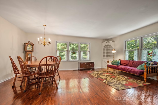 467 Winners Cir, Tryon, NC 28782 - dining room featuring wood-type flooring, plenty of natural light, and a chandelier