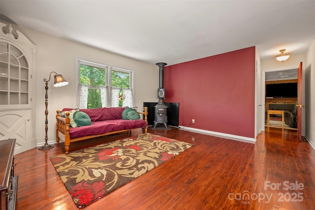 467 Winners Cir, Tryon, NC 28782 - living room featuring wood finished floors and a wood stove