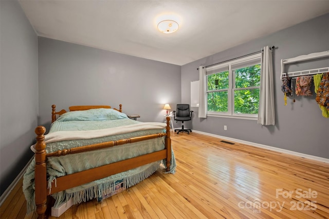 467 Winners Cir, Tryon, NC 28782 - bedroom with hardwood / wood-style flooring and baseboards