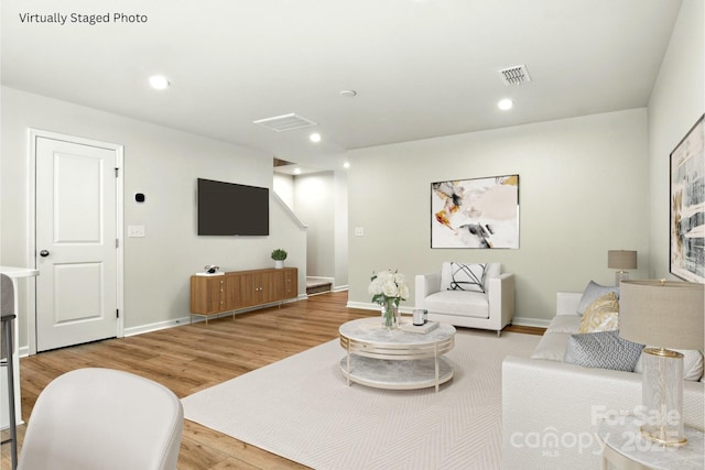1525 39th Avenue Loop NE Unit 4, Hickory, NC 28601 - living room with light wood-style flooring and recessed lighting