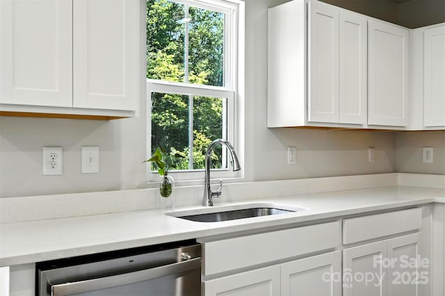 1525 39th Avenue Loop NE Unit 4, Hickory, NC 28601 - kitchen featuring stainless steel dishwasher, light countertops, white cabinets, and healthy amount of natural light