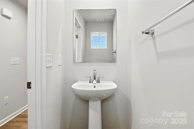 1525 39th Avenue Loop NE Unit 4, Hickory, NC 28601 - bathroom featuring wood finished floors and baseboards