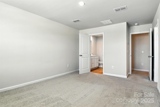 1525 39th Avenue Loop NE Unit 4, Hickory, NC 28601 - unfurnished bedroom featuring light carpet and connected bathroom
