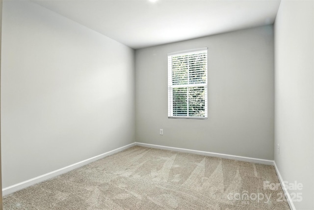 1525 39th Avenue Loop NE Unit 4, Hickory, NC 28601 - carpeted spare room featuring baseboards