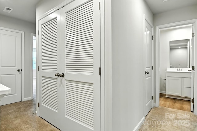1525 39th Avenue Loop NE Unit 4, Hickory, NC 28601 - hallway featuring carpet and a sink
