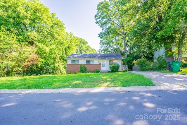 2519 Abelwood Rd, Charlotte, NC 28216 - single story home with brick siding, a front lawn, and asphalt driveway