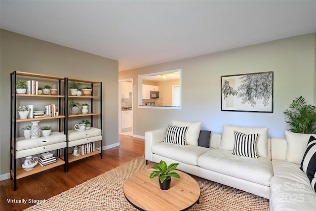 2519 Abelwood Rd, Charlotte, NC 28216 - living area featuring wood finished floors and baseboards