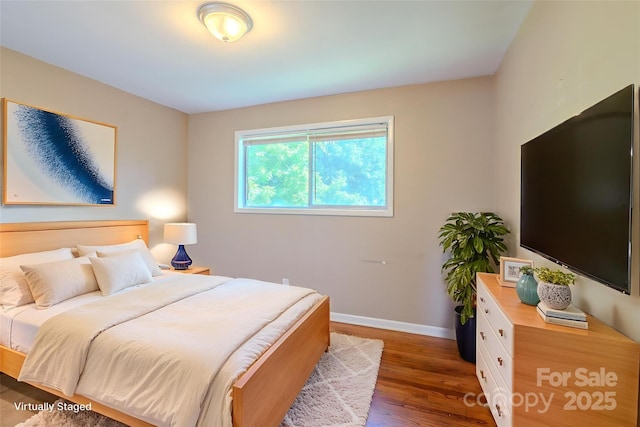 2519 Abelwood Rd, Charlotte, NC 28216 - bedroom featuring wood finished floors and baseboards