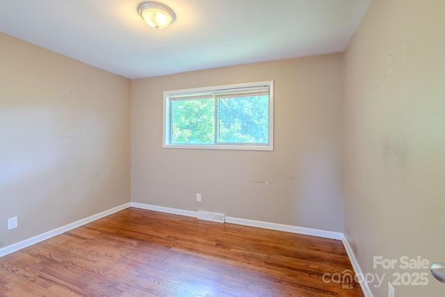 2519 Abelwood Rd, Charlotte, NC 28216 - unfurnished room with wood finished floors