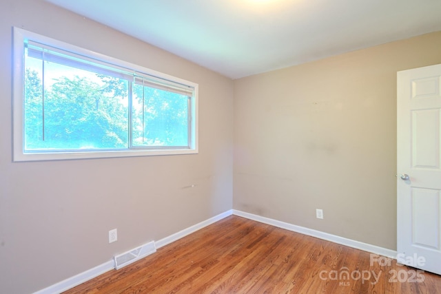2519 Abelwood Rd, Charlotte, NC 28216 - empty room featuring light wood-style floors and baseboards