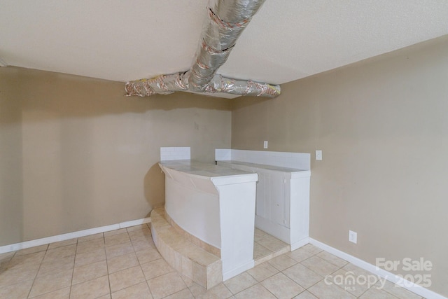 2519 Abelwood Rd, Charlotte, NC 28216 - interior space with light tile patterned flooring