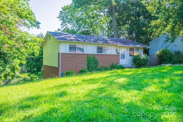 2519 Abelwood Rd, Charlotte, NC 28216 - view of front of home featuring brick siding and a front lawn
