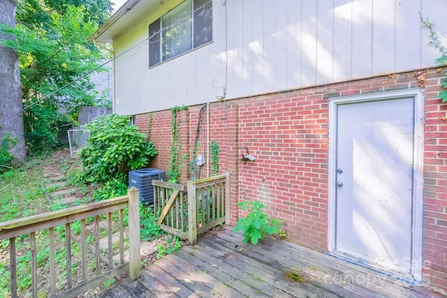 2519 Abelwood Rd, Charlotte, NC 28216 - property entrance with a deck and brick siding
