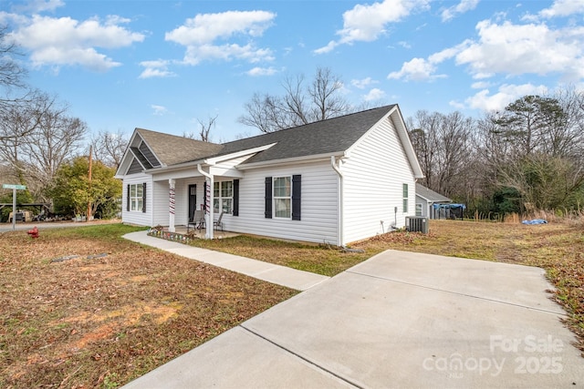 295 Colston St, Albemarle, NC 28001 - single story home featuring a porch, roof with shingles, and a front yard