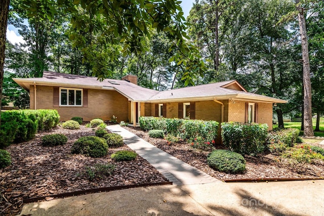 8448 Normandy Rd, Denver, NC 28037 - ranch-style house featuring brick siding and a chimney