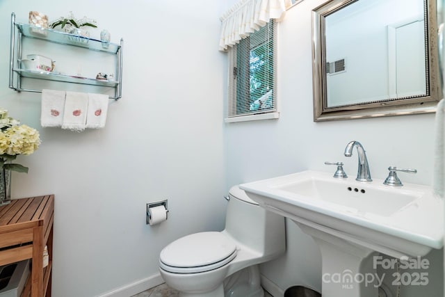8448 Normandy Rd, Denver, NC 28037 - bathroom featuring toilet and baseboards