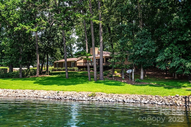 8448 Normandy Rd, Denver, NC 28037 - back of property featuring a lawn and a deck with water view