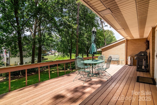 8448 Normandy Rd, Denver, NC 28037 - deck with outdoor dining area, grilling area, and a yard