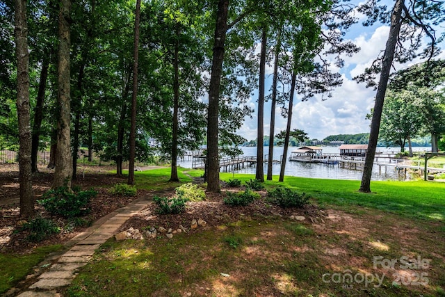 8448 Normandy Rd, Denver, NC 28037 - view of green lawn with a water view and a dock