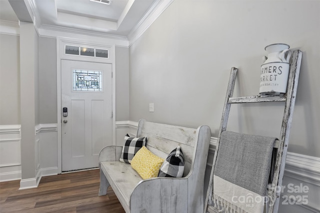 10906 Angler Ct, Davidson, NC 28036 - entrance foyer featuring dark wood finished floors, crown molding, wainscoting, and a raised ceiling