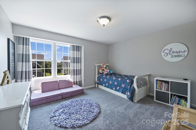 10906 Angler Ct, Davidson, NC 28036 - carpeted bedroom featuring baseboards