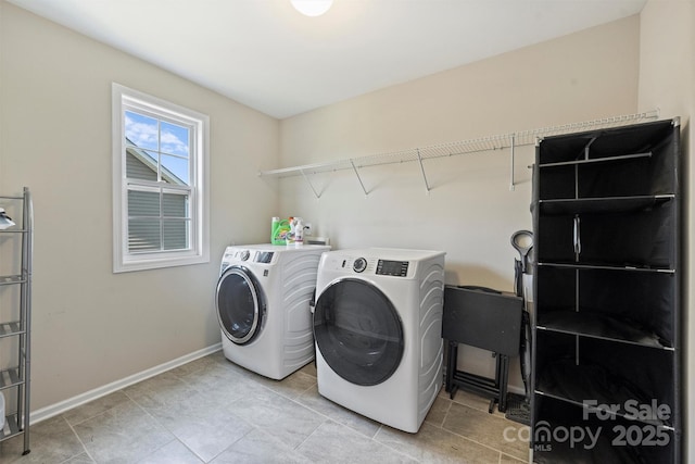 10906 Angler Ct, Davidson, NC 28036 - washroom featuring washing machine and clothes dryer and light tile patterned floors