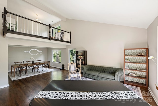 9334 Hunting Ct, Matthews, NC 28105 - living area with wood finished floors, high vaulted ceiling, and beamed ceiling