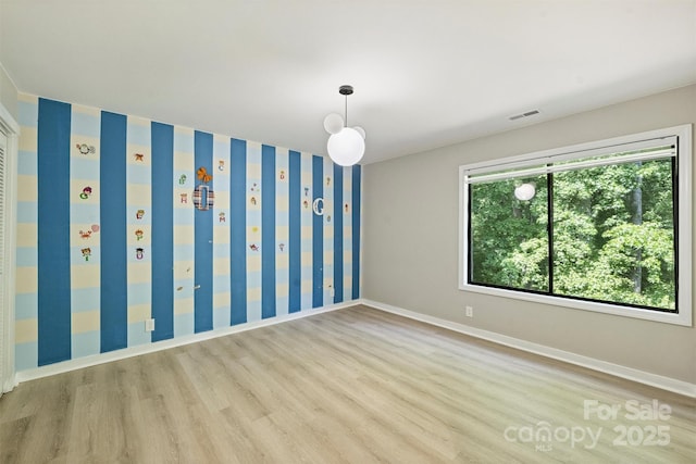 9334 Hunting Ct, Matthews, NC 28105 - spare room with wood finished floors and baseboards