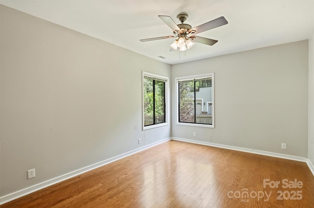 9334 Hunting Ct, Matthews, NC 28105 - spare room featuring wood finished floors and a ceiling fan