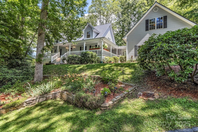 59 Old Lakey Gap Rd, Black Mountain, NC 28711 - view of front facade featuring a porch and a front yard