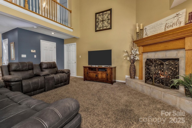 59 Old Lakey Gap Rd, Black Mountain, NC 28711 - living area with a towering ceiling, carpet floors, and a tile fireplace
