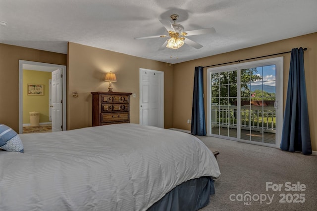 59 Old Lakey Gap Rd, Black Mountain, NC 28711 - carpeted bedroom featuring access to outside, ceiling fan, and ensuite bathroom
