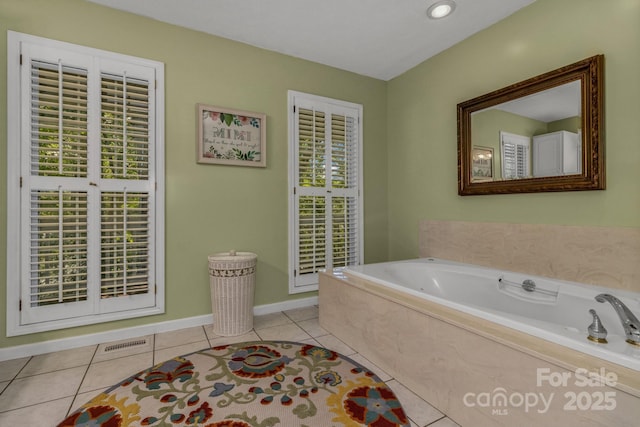 59 Old Lakey Gap Rd, Black Mountain, NC 28711 - bathroom with a bath and tile patterned floors