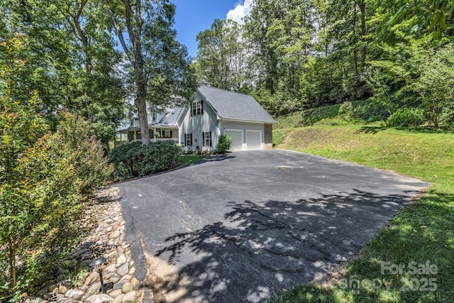 59 Old Lakey Gap Rd, Black Mountain, NC 28711 - view of home's exterior with asphalt driveway and a lawn