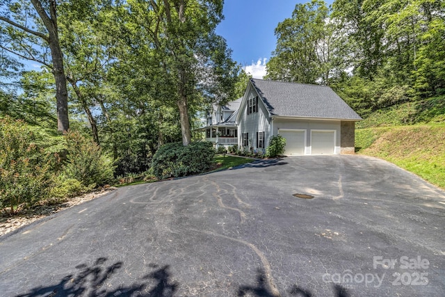 59 Old Lakey Gap Rd, Black Mountain, NC 28711 - view of front of house featuring driveway and roof with shingles