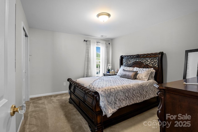 10621 Shanon Darby Ln, Charlotte, NC 28214 - bedroom featuring carpet and baseboards