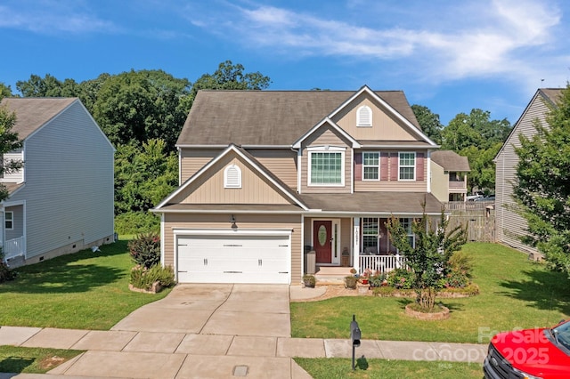 10621 Shanon Darby Ln, Charlotte, NC 28214 - traditional home with covered porch, driveway, a garage, and board and batten siding