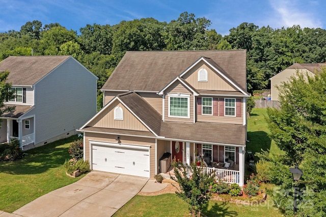 10621 Shanon Darby Ln, Charlotte, NC 28214 - traditional-style home featuring covered porch, board and batten siding, driveway, and a front lawn