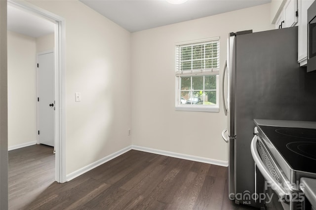 6013 Heath Valley Rd, Charlotte, NC 28210 - kitchen featuring dark wood-style flooring, appliances with stainless steel finishes, and white cabinetry