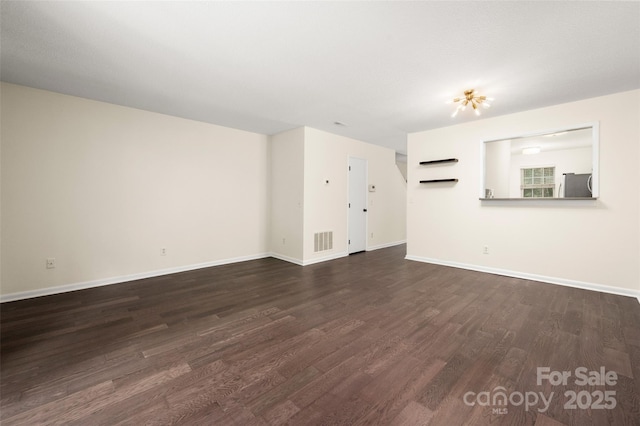 6013 Heath Valley Rd, Charlotte, NC 28210 - unfurnished living room with dark wood-style floors and baseboards